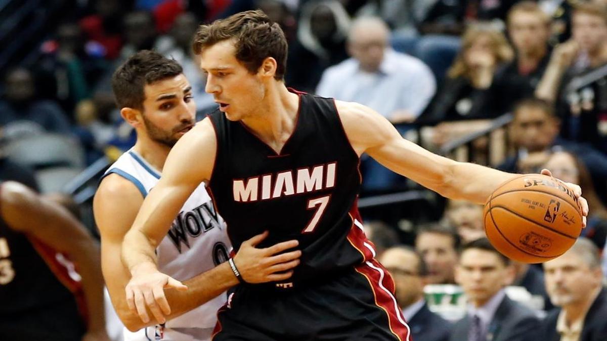 Minnesota Timberwolves’ Ricky Rubio, left, of Spain, tries to slow up Miami Heat’s Goran Dragic, from Slovania, while driving in the first quarter of an NBA basketball game, Thursday, Nov. 5, 2015, in Minneapolis.