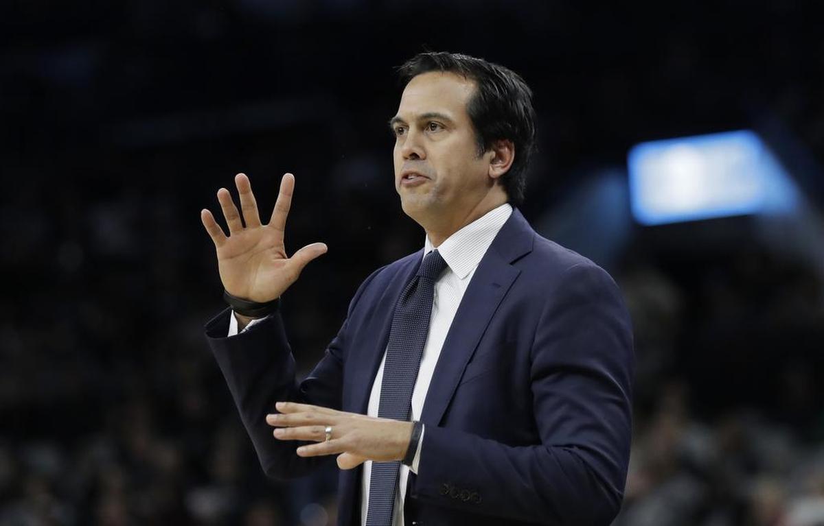 Miami Heat coach Erik Spoelstra signals to his players during the first half of an NBA basketball game against the San Antonio Spurs, Wednesday, Dec. 6, 2017, in San Antonio.