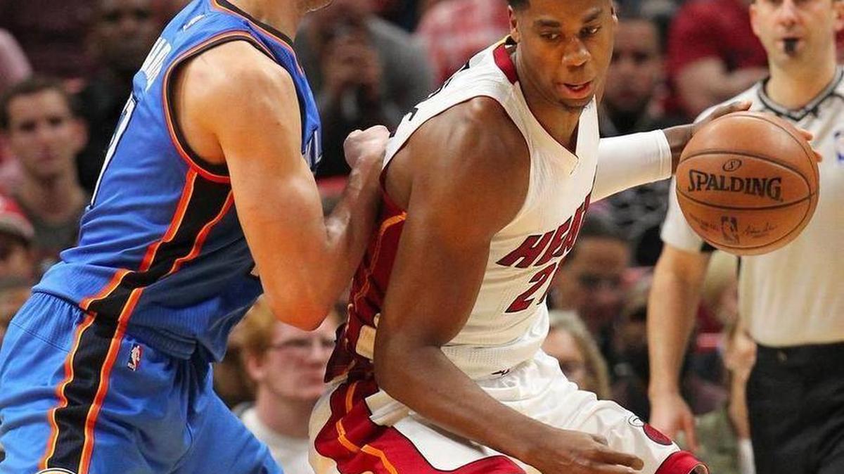 Miami Heat center Hassan Whiteside drives to the basket against Oklahoma City Thunder center Enes Kanter during the fourth quarter of an NBA basketball game at AmericanAirlines Arena in Miami on Tues., Dec. 27, 2016.