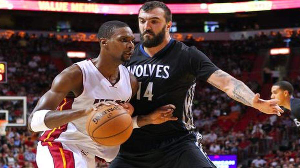 
Chris Bosh drives to the basket Nov. 8 against the Timberwolves’ Nikola Pekovic. 
