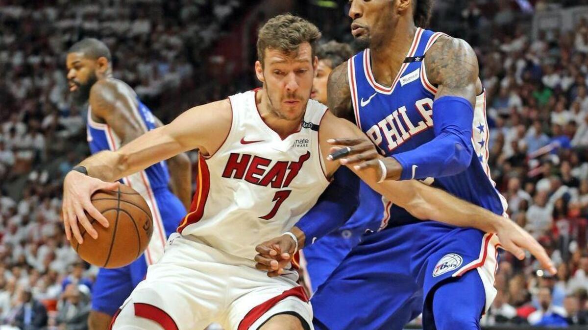 Heat guard Goran Dragic tries to drive past 76ers forward Robert Covington during Thursday night’s Game 2 at AmericanAirlines Arena. Dragic had a team-high 23 points but it wasn’t enough as Philadelphia stole back homecourt advantage with a win in Miami.