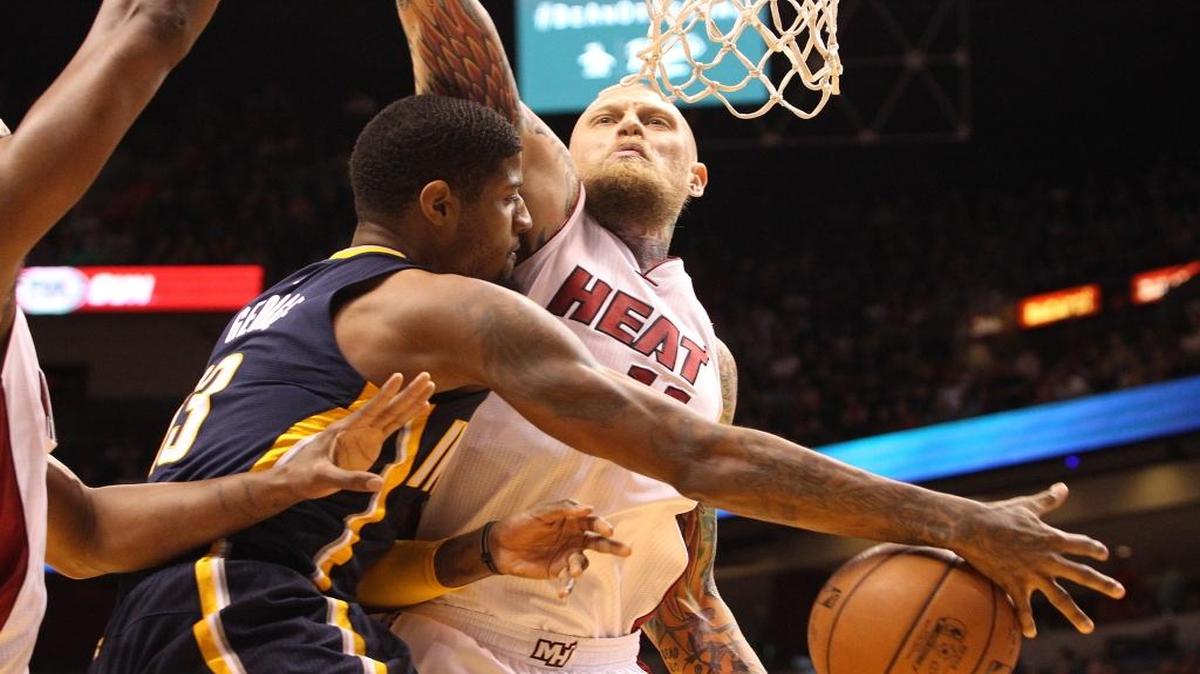 Paul George goes up against Chris Andersen in the first quarter during the Miami Heat’s game against the Indiana Pacers on Monday, January 4, 2016 at AmericanAirlines Arena.