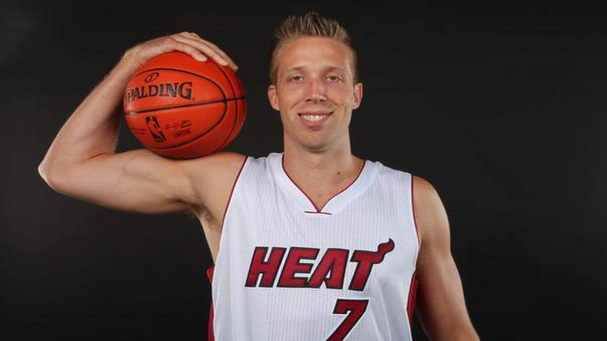 
Miami Heat center Justin Hamilton poses for a portrait during Media Day at AmericanAirlines Arena in Miami on Friday, Sept. 26, 2014.

