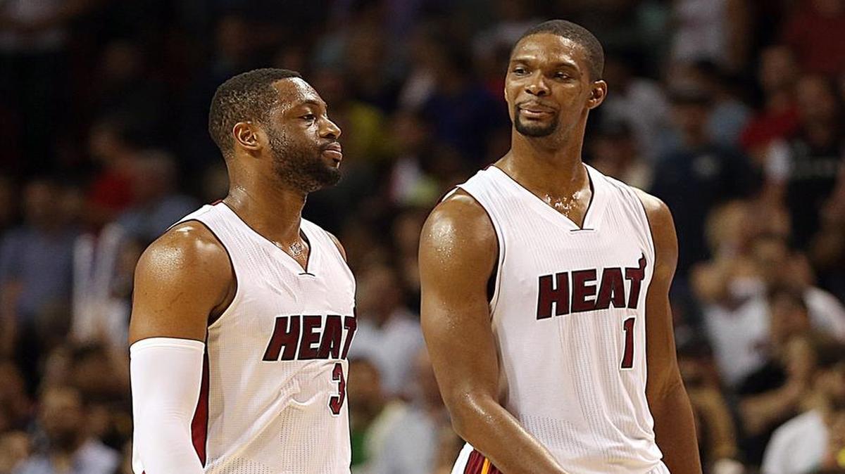 
Dwyane Wade and Chris Bosh react during the Miami Heat’s game against the Orlando Magic at AmericanAirlines Arena in Miami on Monday, December 29, 2014.
