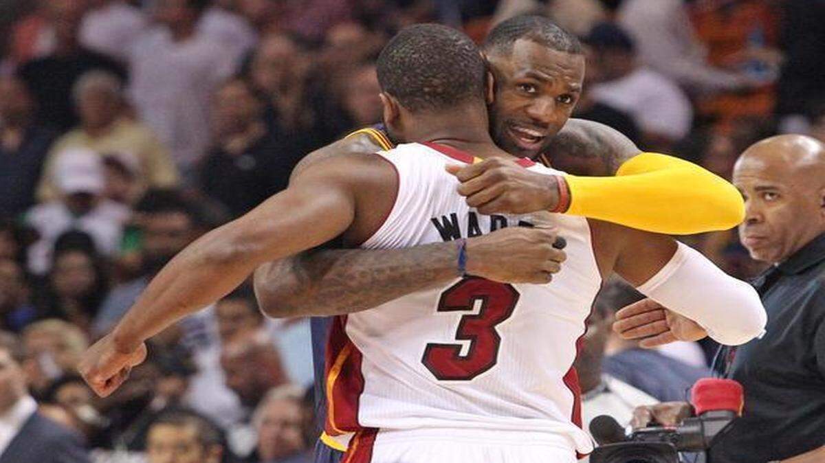 
 LeBron James hugs Dwyane Wade before the Miami Heat’s game against the Cleveland Cavaliers at AmericanAirlines Arena on Monday, March 16, 2015.

