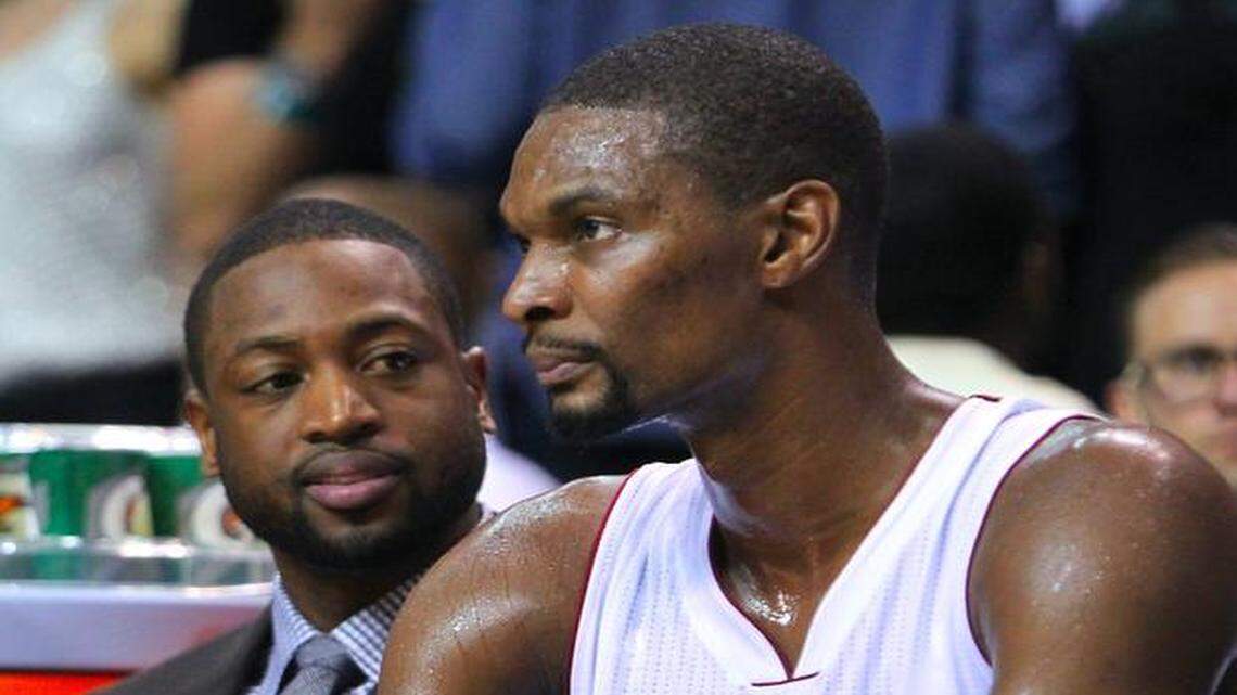 
Struggling: With an injured Dwyane Wade on the bench, Chris Bosh, right, and the Heat have struggled to find consistency early this season.
