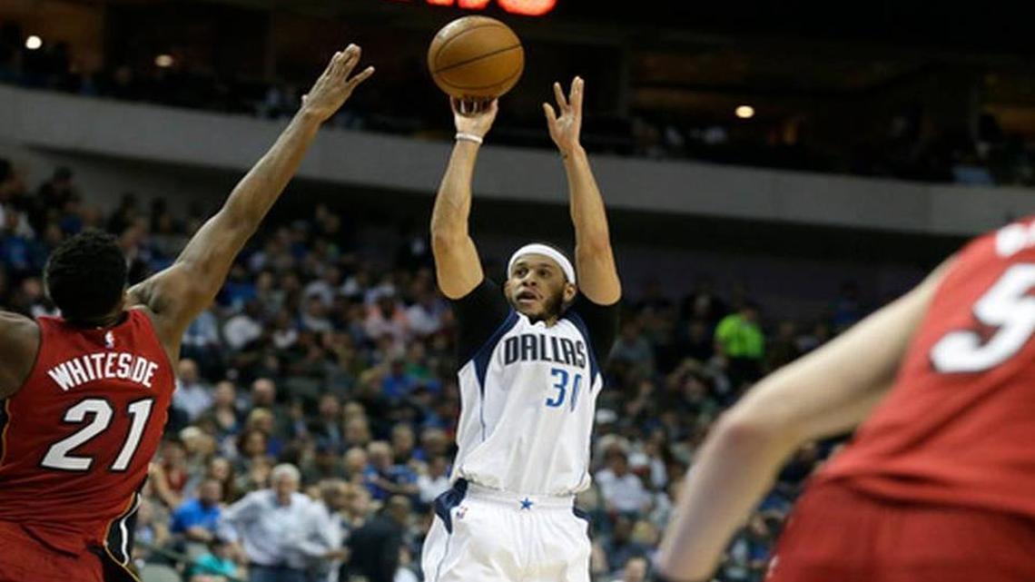 Seth Curry buries the go-ahead three-pointer over the Heat’s Hassan Whiteside late in the fourth quarter.