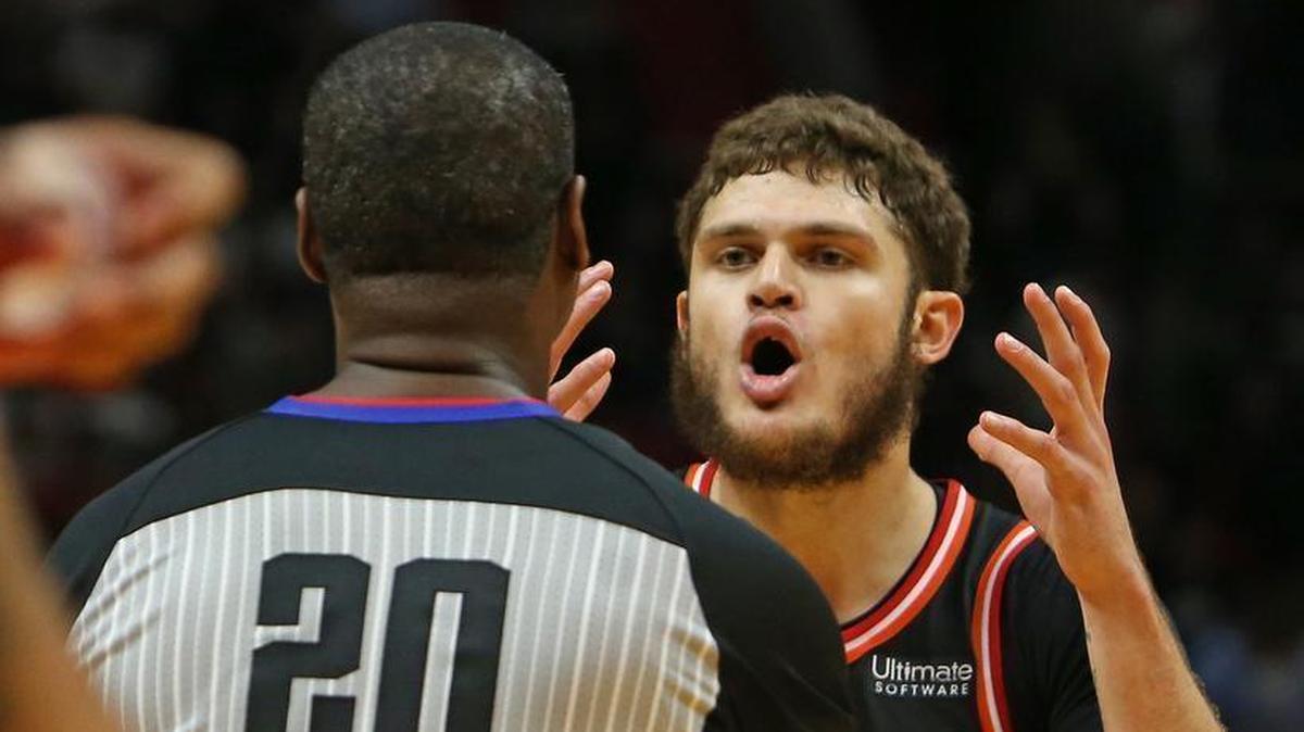Miami Heat guard Tyler Johnson argues a play and gets hit with a technical foul by official Leroy Richardson during the fourth quarter of a 102-93 loss to the Washington Wizards at AmericanAirlines Arena in Miami on Wed., Nov.15, 2017.