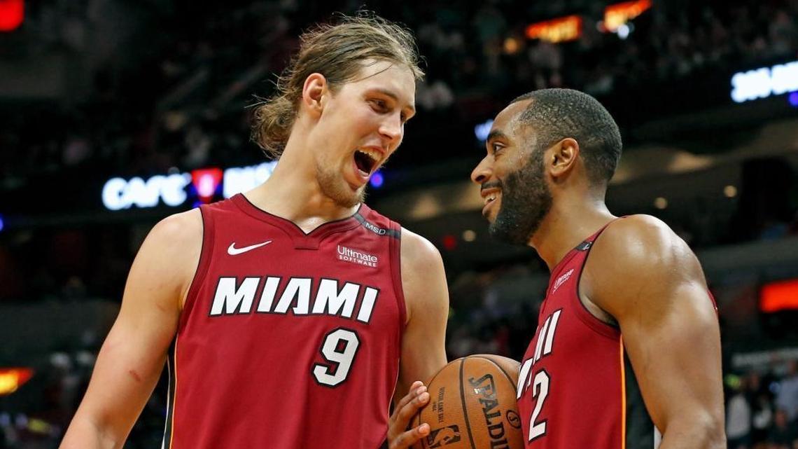 Miami Heat Kelly Olynyk (9) screams at Wayne Ellington (2) after they defeated the Denver Nuggets in double overtime Monday, March 19, 2018, at the AmericanAirlines Arena in Miami.