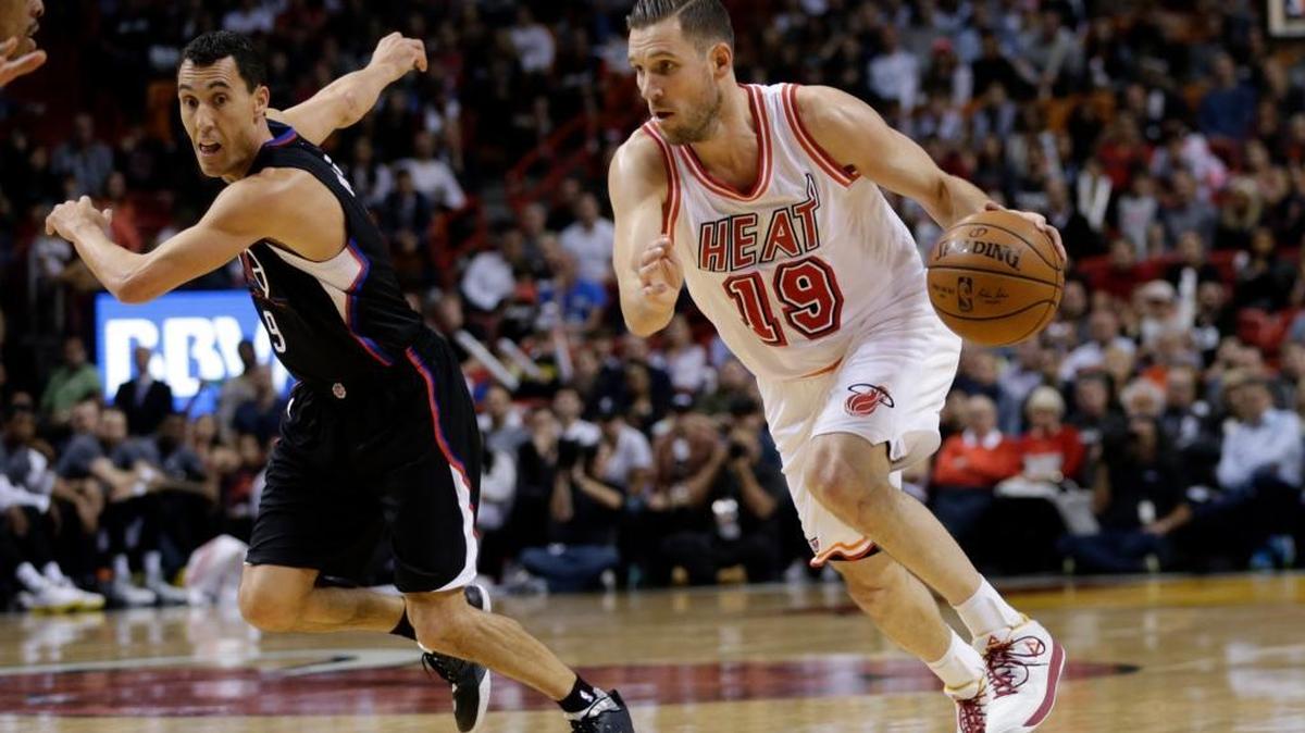 Miami Heat guard Beno Udrih moves down the court as Los Angeles Clippers guard Pablo Prigioni defends during the second half Sunday, Feb. 7, 2016, in Miami.
