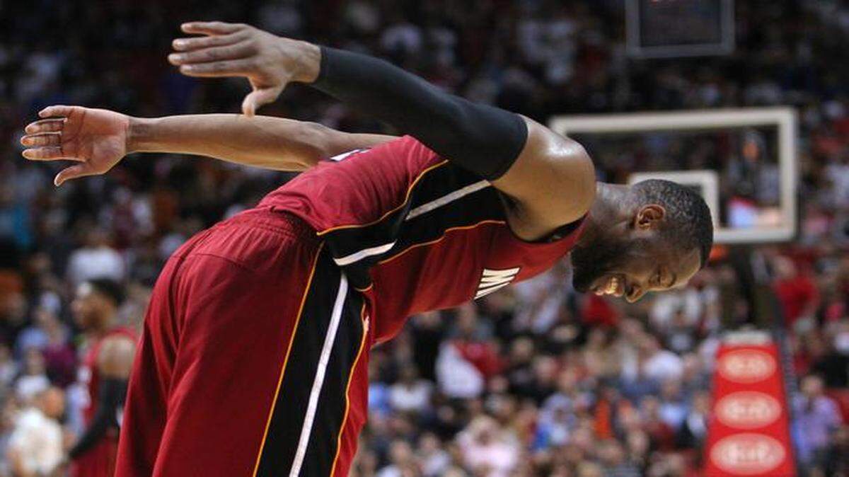 
Miami Heat guard Dwyane Wade, here during a game against the Washington Wizards on Friday, Dec. 19, did not play against the Boston Celtics on Sunday, Dec. 21, because of a bruised knee.
