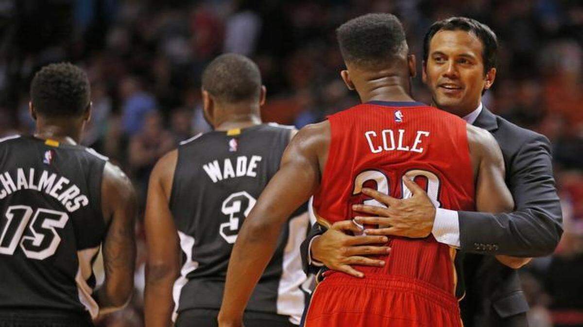 
Miami Heat head coach Erik Spoelstra hugs New Orleans Pelicans guard and former Heat player, Norris Cole (30) after the Miami Heat host the New Orleans Pelicans at AmericanAirlines Arena in Miami on Feb. 21, 2015.
