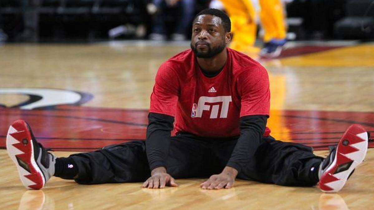 
Heat guard Dwyane Wade, shown stretching before a game against Indiana on Jan. 23, 2015, missed his seventh consecutive game Wednesday night in Cleveland. 
