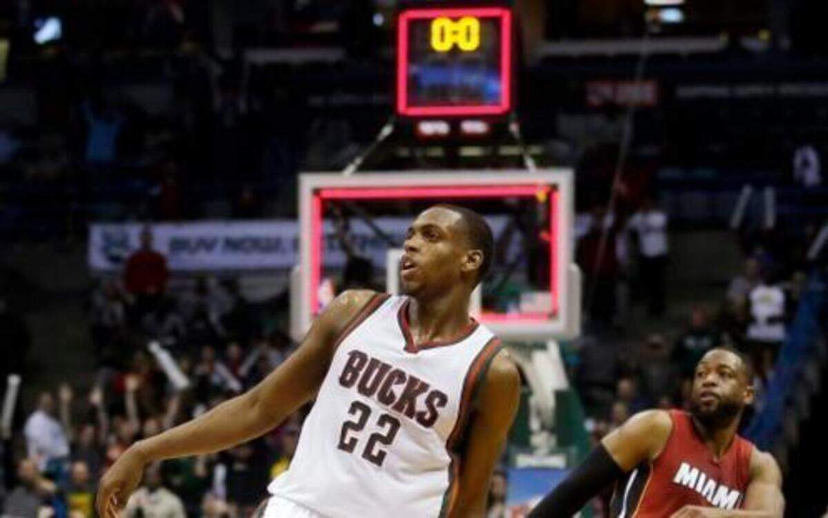 
Milwaukee Bucks' Khris Middleton watches his winning shot against the Miami Heat in an NBA basketball game Tuesday, March 24, 2015, in Milwaukee. The Bucks won 89-88.
