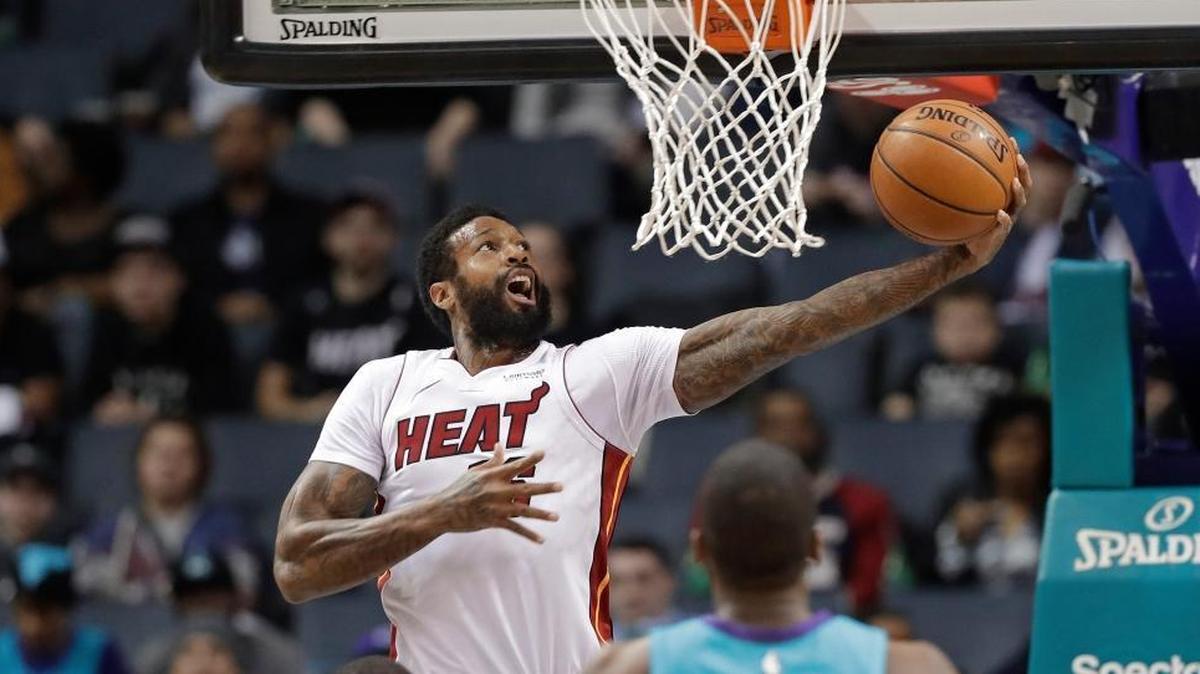 Miami Heat's James Johnson goes up to dunk against the Charlotte Hornets during the first half of an NBA basketball game in Charlotte, N.C., Saturday, Jan. 20, 2018. He finished with 22 points.