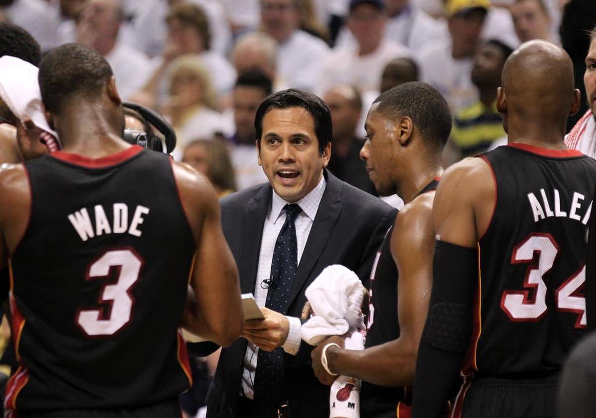 Miami Heat head coach Erik Spoelstra talks to shooting guard Dwyane Wade (left), point guard Mario Chalmers (third from right), and shooting guard Ray Allen (right) during a timeout in Game 3 of the Eastern Conference Finals at Bankers Life Fieldhouse in Indianapolis, Indiana on Sunday, May 26, 2013.
