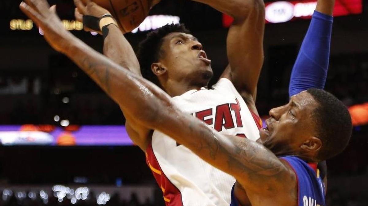 Heat’s Josh Richardson, left, takes the shot over Piston’s Kentavious Caldwell-Pope, right, during the first half of the Heat vs. Pistons game inside the American Airlines Arena on Sunday, January 1, 2017.