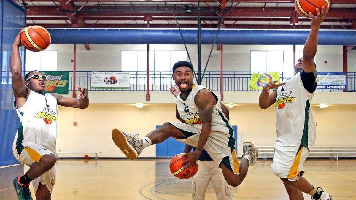 
From left, Kenny Bellinger Jr. (Hialeah American High), Raymond Taylor (American Heritage) and George Gray (Miami Northwestern) practice with the Miami Midnites. 


