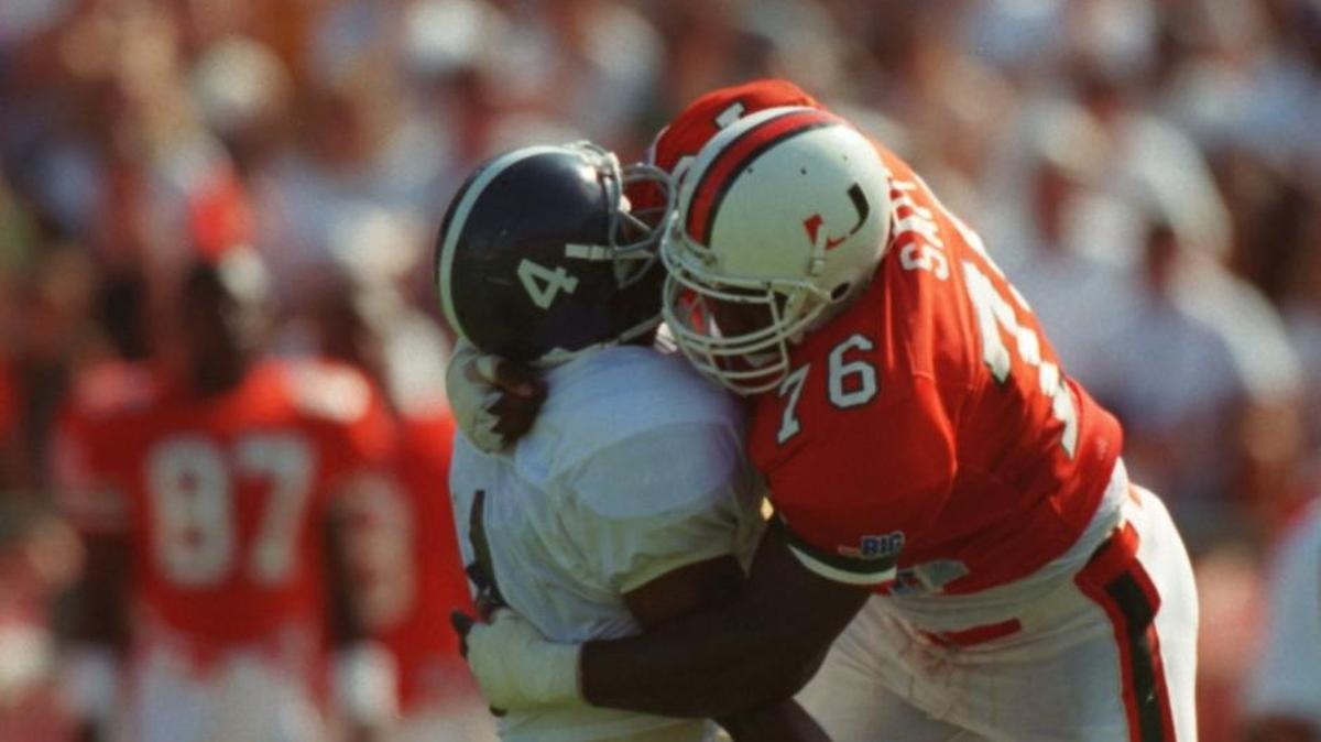 Warren Sapp sacks Georgia Southern quarterback Joe Dupree during the Hurricanes’ record-setting 56th consecutive home victory at the Orange Bowl in 1994.