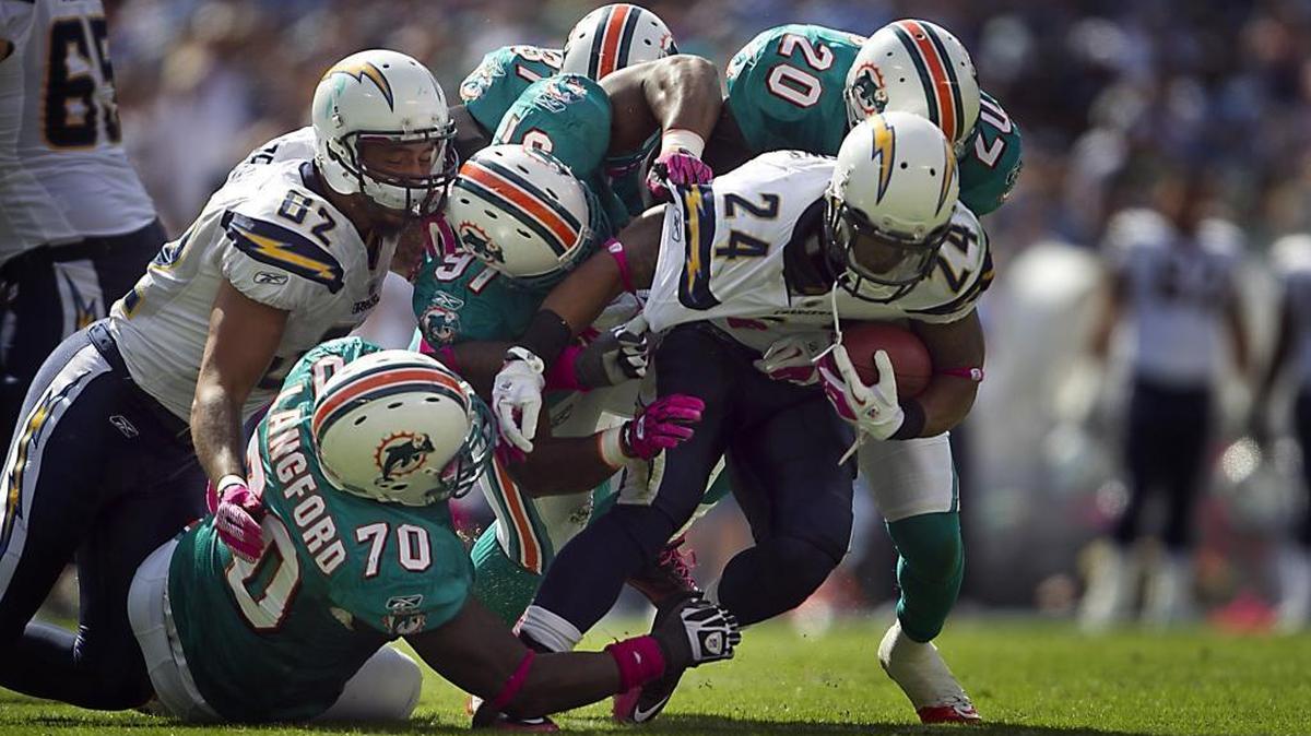 Kendall Langford, wearing No. 70 in this file photo, spent four years with the Dolphins.