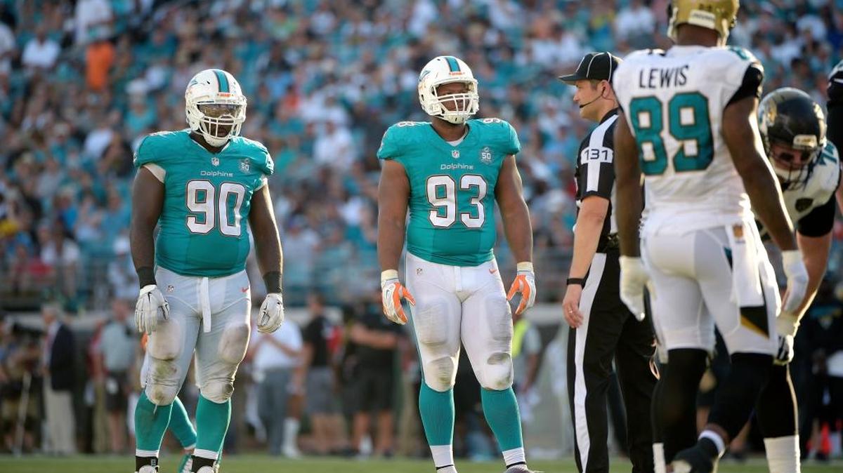 
Miami Dolphins defensive linemen Earl Mitchell (90) and Ndamukong Suh (93) have zero sacks so far, and Mitchell missed practice Thursday, Sept. 24, 2015 with a back injury. 
