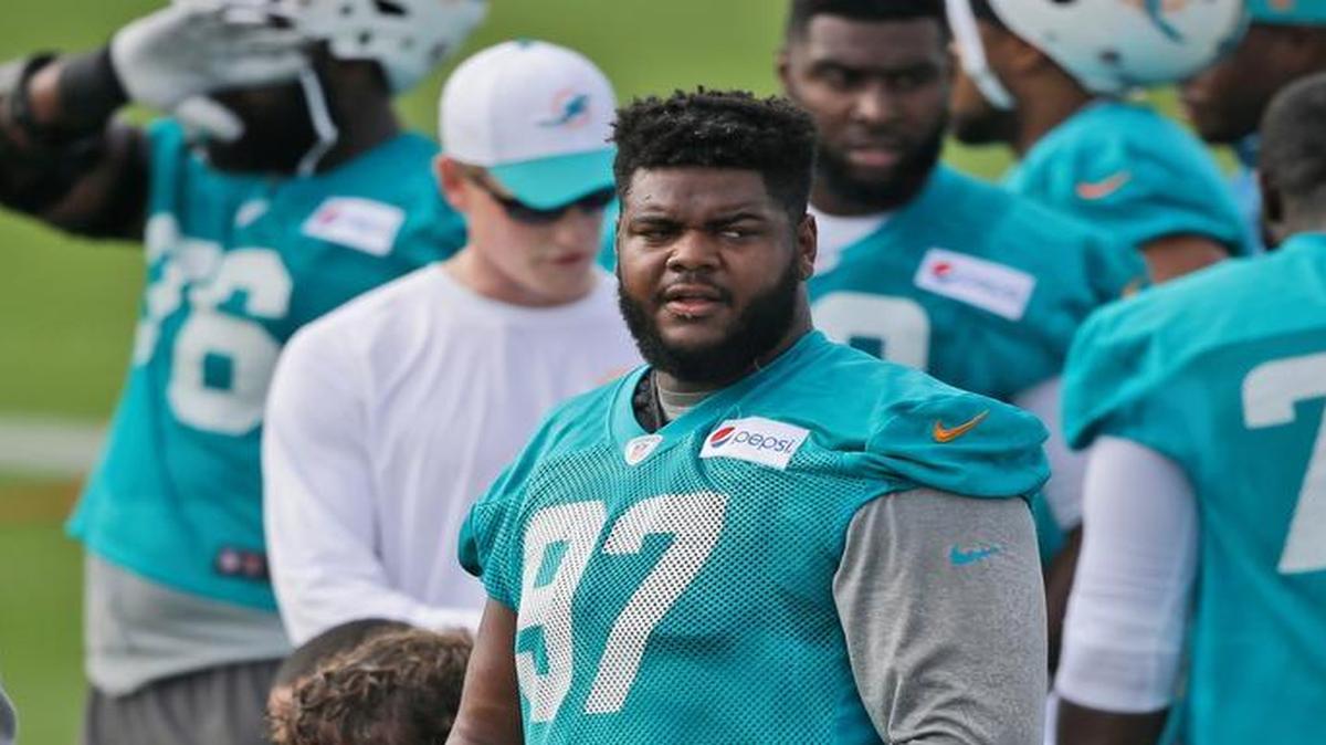 
Miami Dolphins defensive tackle Jordan Phillips (97) looks on during Day 1 of training camp Thursday, July 30, 2015, in Davie, Fla. 
