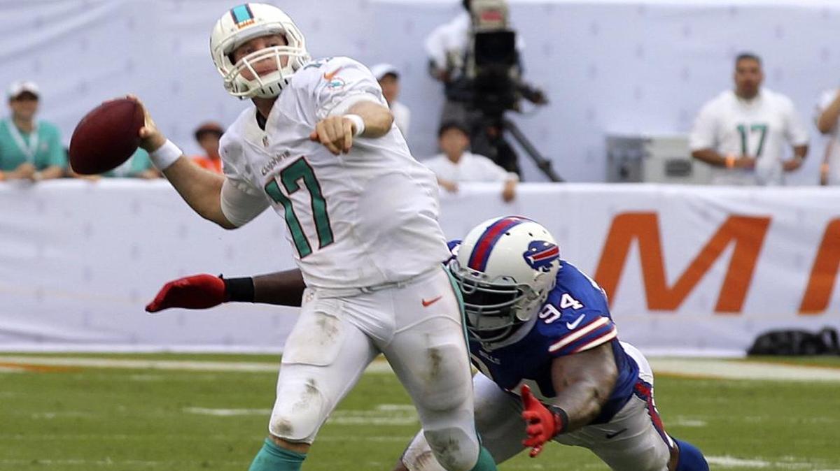 Buffalo Bills defensive end Mario Williams pressures Miami Dolphins quarterback Ryan Tannehill.