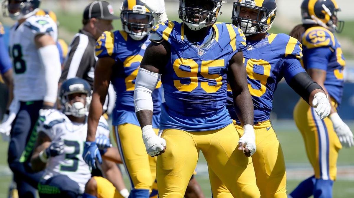 Los Angeles Rams defensive end William Hayes celebrates after bringing Seattle Seahawks running back Thomas Rawls down for a loss in the first quarter on Sunday, Sept. 18, 2016 at the Los Angeles Memorial Coliseum in Los Angeles.