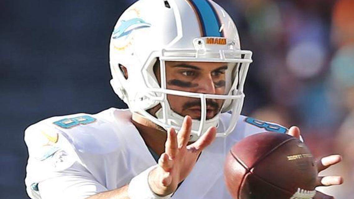 Miami Dolphins quarterback Matt Moore plays against the San Diego Chargers at Sun Life Stadium on Sunday, Nov. 2, 2014.