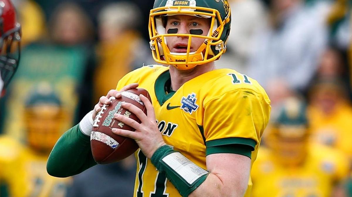 North Dakota State quarterback Carson Wentz prepares to pass against Jacksonville State in the FCS championship game Saturday, Jan. 9, 2016, in Frisco, Texas. North Dakota State won 37-10 for its fifth straight championship.