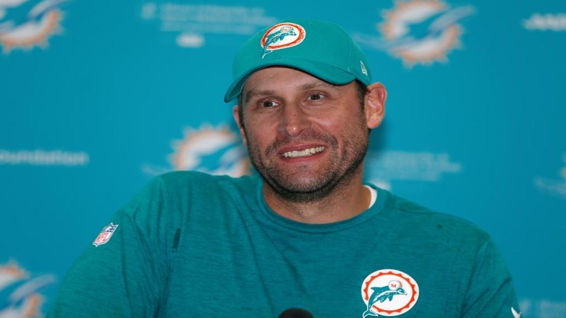 Adam Gase smiles as he speaks during a news conference after an NFL organized team activities football practice Thursday.
