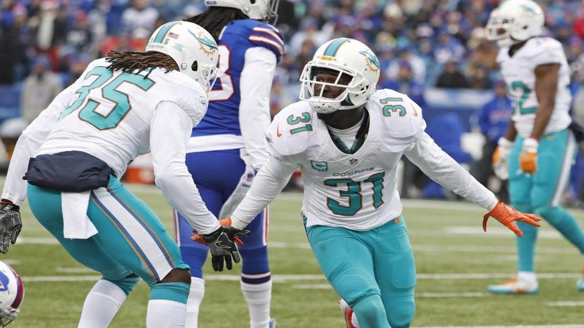 Dolphins safety Michael Thomas will remain in aqua and orange in 2017.