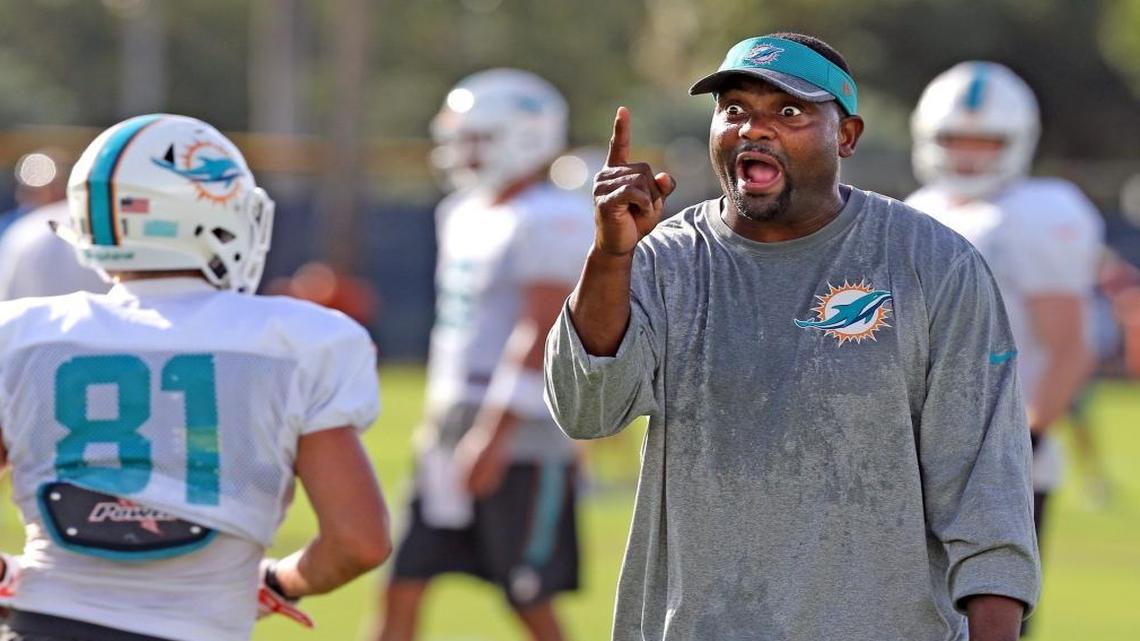 Dolphins receivers coach Shawn Jefferson, who had 29 touchdowns in his NFL career, yells at his squad during a practice on August 15, 2016.