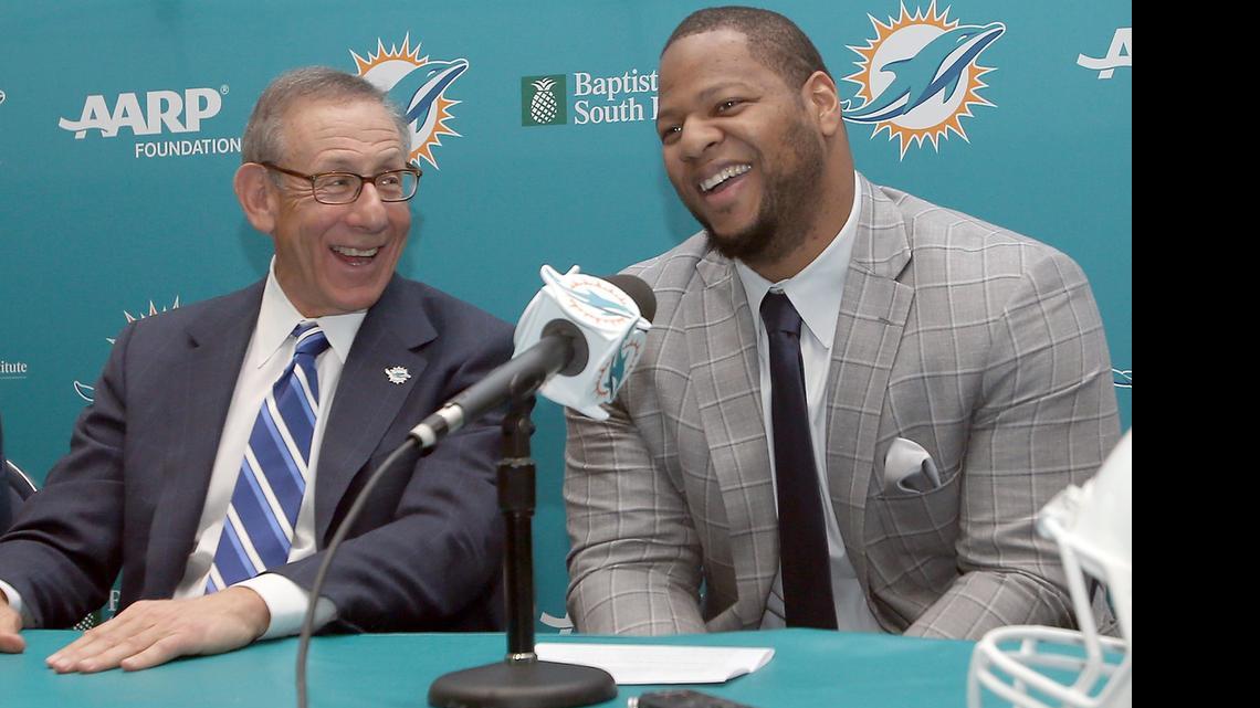
Miami Dolphins owner Stephen Ross is pictured with Ndamukong Suh during Suh’s introductory press conference Wednesday, March 11, 2015.
