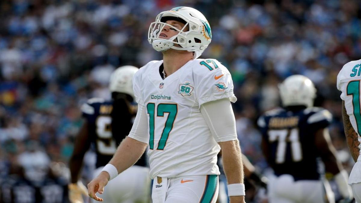 Miami Dolphins quarterback Ryan Tannehill walks to the sidelines during the first half in an NFL football game against the San Diego Chargers Sunday, Dec. 20, 2015, in San Diego.
