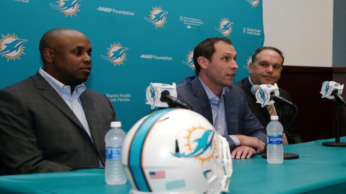 ‘What we’ve built is a very competitive roster. It has a chance to be good, but we’ll see where it ends up,’ Dolphins general manager Chris Grier, left, said.