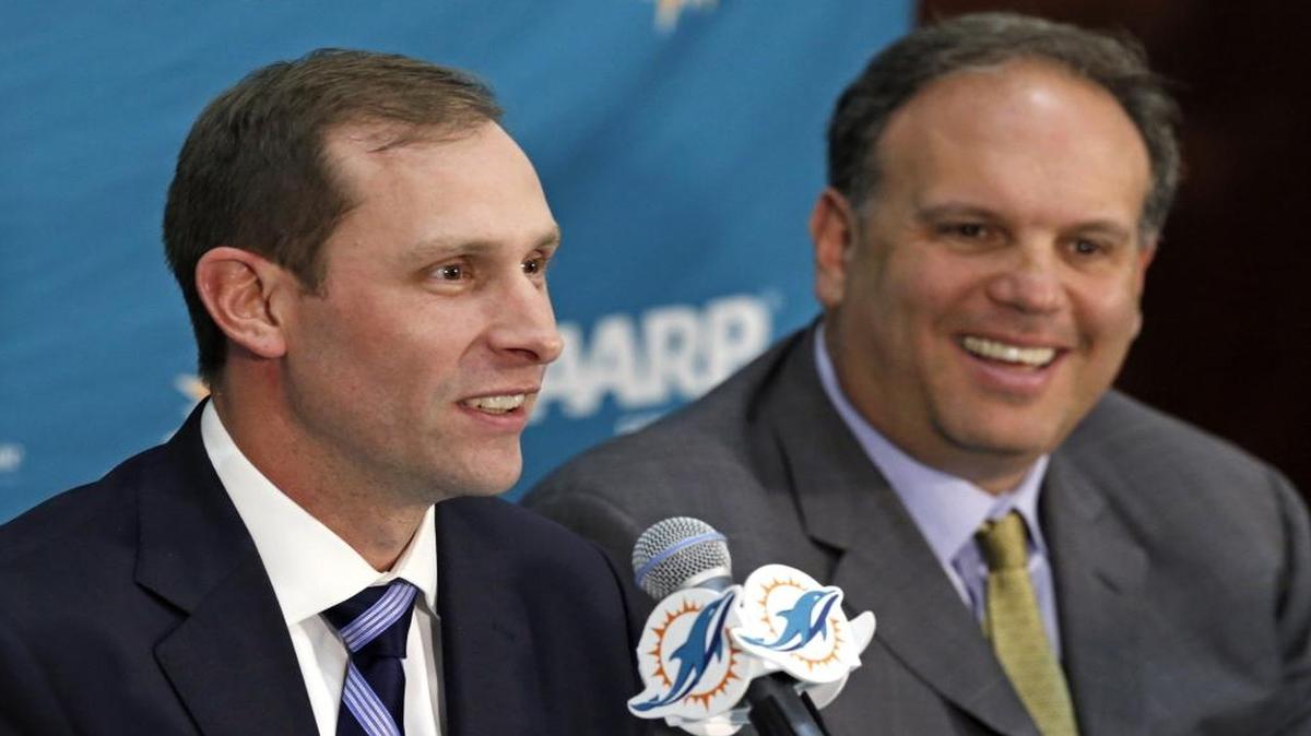 Mike Tannenbaum, right, and Adam Gase have proved to be a winning team.