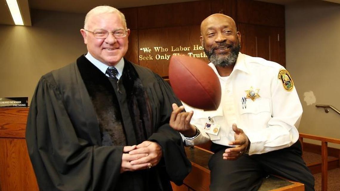 
Former Miami Dolphins player Tony Nathan is now a bailiff in the Miami-Dade courtroom of Judge Edward Newman. 

