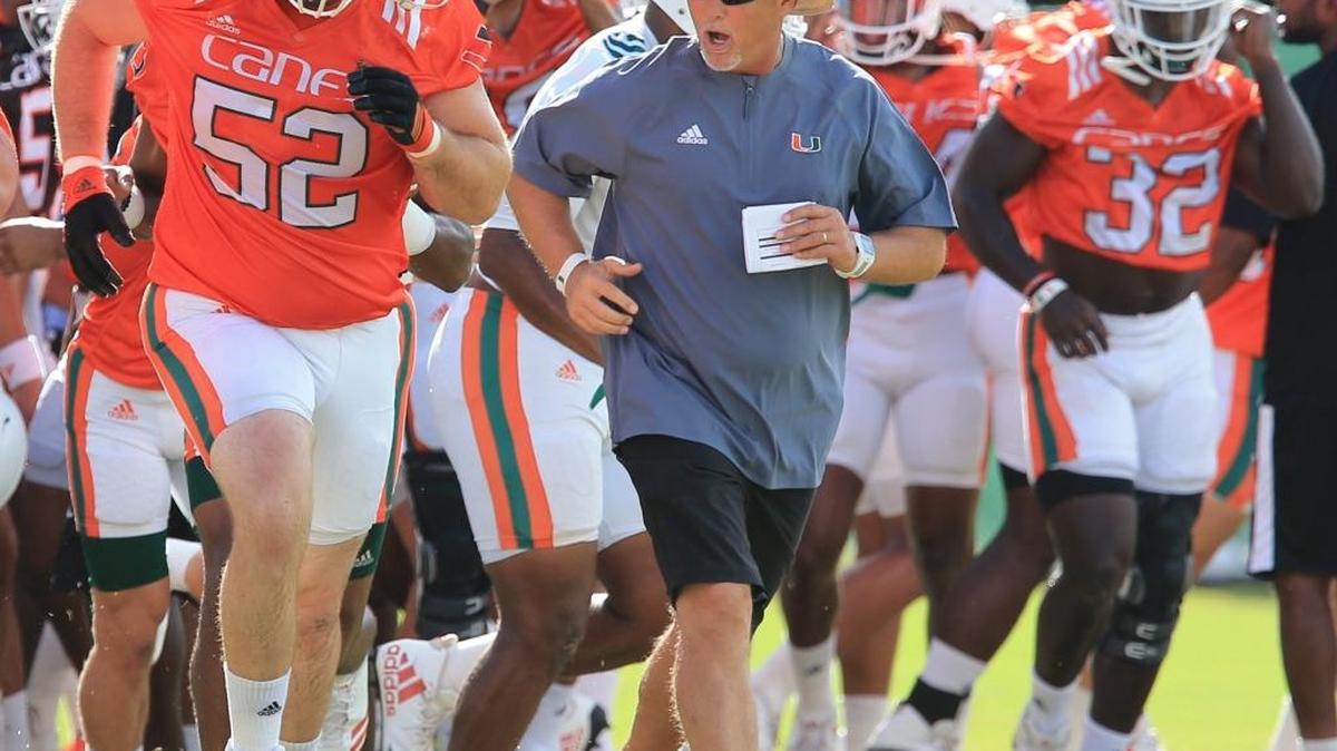 Miami coach Mark Richt leads practice on August 23.