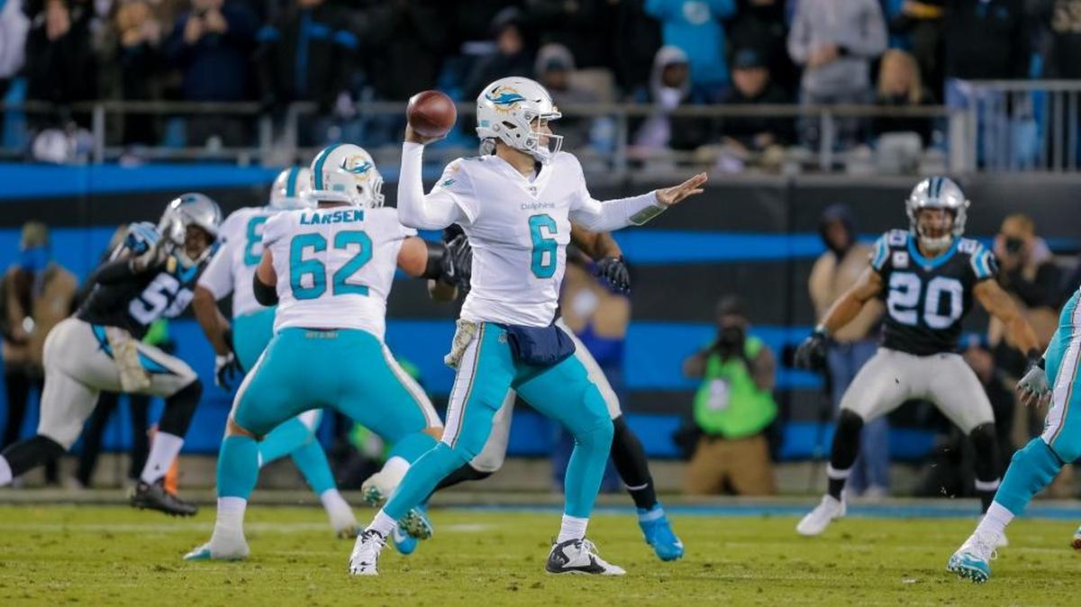 Miami Dolphins' Jay Cutler (6) aims a pass against the Carolina Panthers during the first half of an NFL football game in Charlotte, N.C., Mon., Nov. 13, 2017. The Panthers won 45-21.