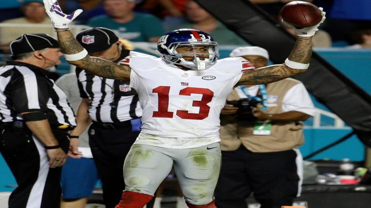 Giants receiver Odell Beckham Jr. celebrates one of his two touchdowns in the second half against the Dolphins on Monday night. He finished with seven catches for 166 yards.