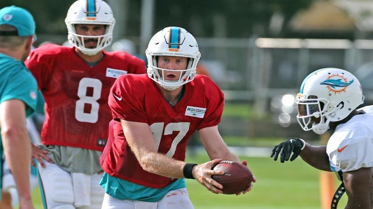 Miami Dolphins quarterbacks Matt Moore (8) with Ryan Tannehill (17) during training camp at the Miami Dolphins training facility in Davie, Fl, Aug. 3, 2017.