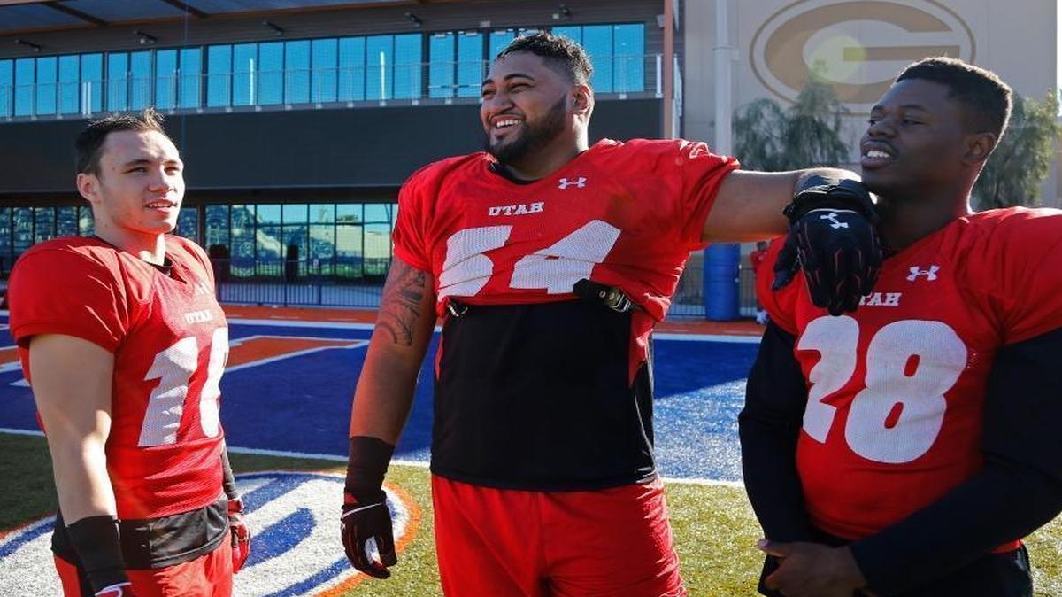 Isaac Asiata, center, goes from Utah to South Florida.