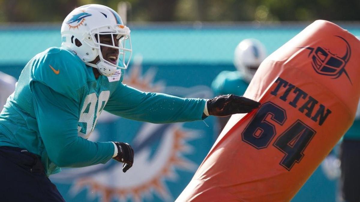 Dolphins defensive end Nick Williams completes a drill during training camp at the Miami Dolphins training facility in Davie on July 30, 2017.