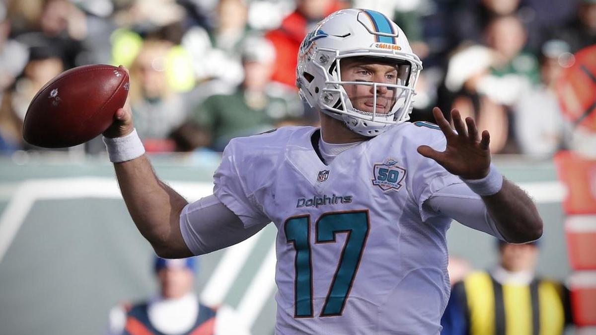 Ryan Tannehill, above, will have more latitude under new offensive coordinator Zac Taylor, but the Dolphins have injuries in their receiving corps and are facing a Ravens defense that still knows how to get to the quarterback.