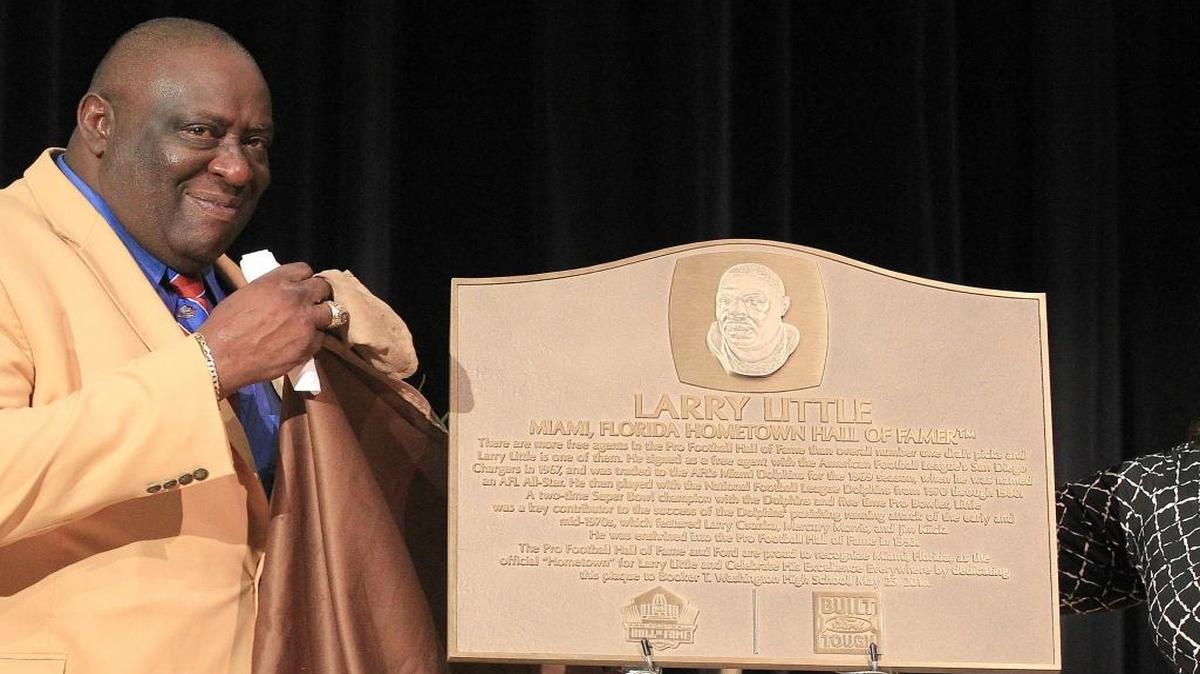 Larry Little looks towards the audience after unveiling his plaque at Booker T. Washington High School. The Pro Football Hall of Fame and Ford Motor Company paid tribute to former Miami Dolphins Larry Little at his high school alma mater, Booker T. Washington High School on Wednesday, May 25th, 2016. Little was honored as part of the "Hometown Hall of Famer program.