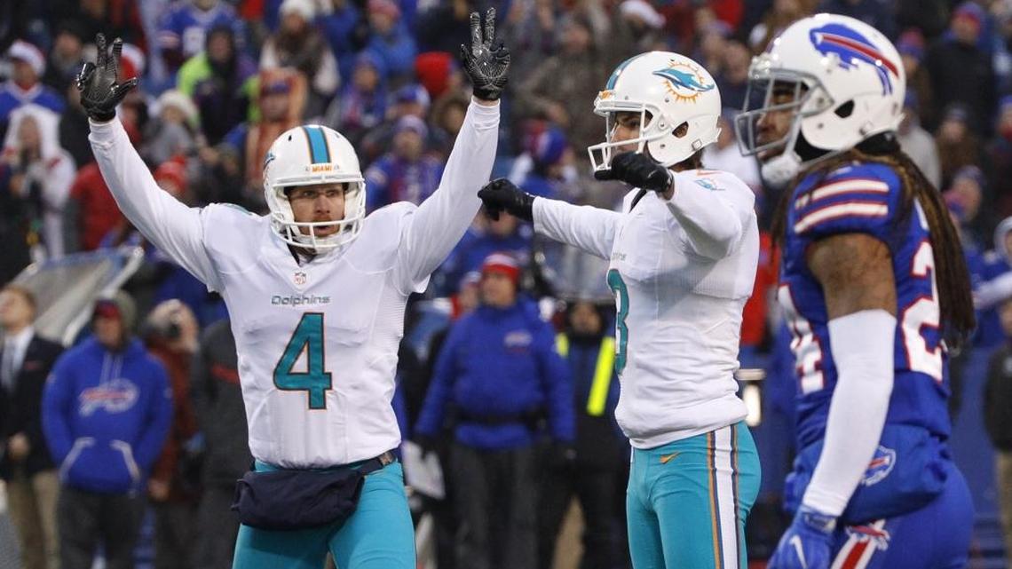 Miami kicker Andrew Franks celebrates his game-tying field goal to force overtime against the Bills on Saturday.