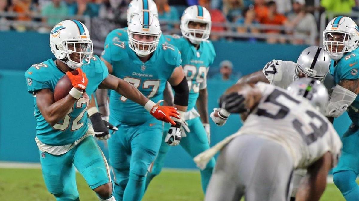 Jesse Davis (No. 77) is starting at right tackle Monday night.
