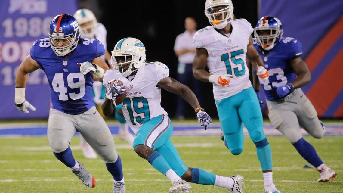 Miami Dolphins wide receiver Jakeem Grant (19) runs the ball against the New York Giants during the fourth quarter of a preseason NFL football game, Friday, Aug. 12, 2016, in East Rutherford, N.J.