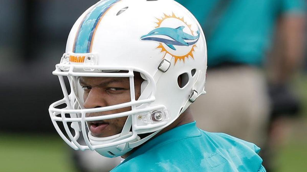 
Miami Dolphins defensive tackle Ndamukong Suh is shown during an NFL organized team activities football practice, Tuesday, May 26, 2015, at the Dolphins training facility in Davie, Fla. 

